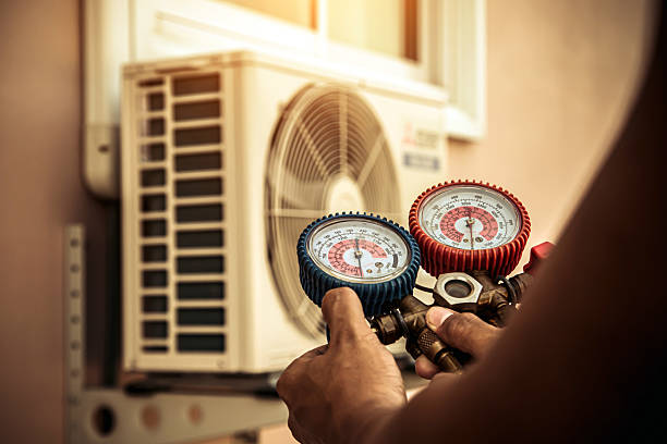 Professional Air Conditioning Service technician working in Coldwater, MI